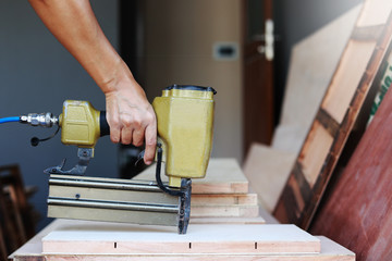 carpenter making the furniture