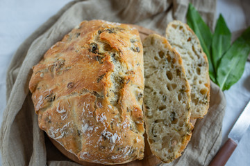 freshly baked home made no knead bread with wild garlic