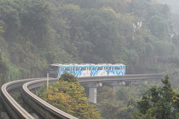 LIght railway passing accross mountain in Chongqing, China
