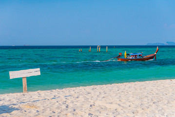 The white sand beach with the long tail boat of Koh Lipe, Thailand
