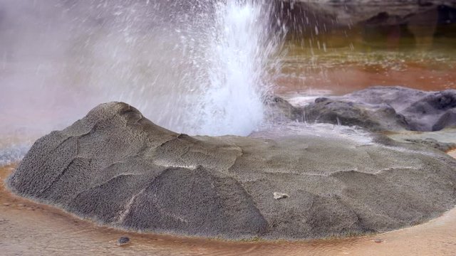 Close up shot of gurgling geyser cone at El Tatio, the third-largest geothermal field in the world, located in the Atacama desert in northern Chile near the border with Bolivia.