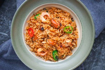 Asian Cuisine,  Fried rice, Nasi goreng, Seafood rice on dark background