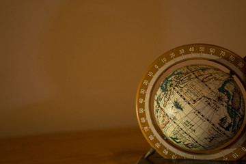 Fototapeta na wymiar earth globe globe on wood