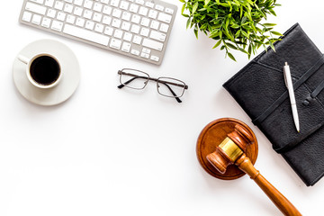 Judge gavel near documents and keyboard - lawyer concept - on white background top-down copy space