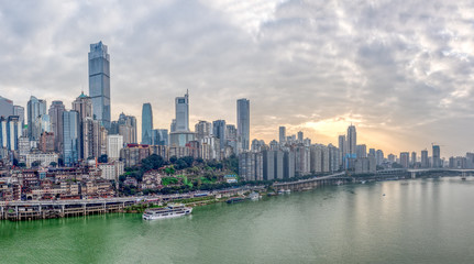 Chongqing, China - Dec 22, 2019: Sunset over Jialing river with dense residence buiding