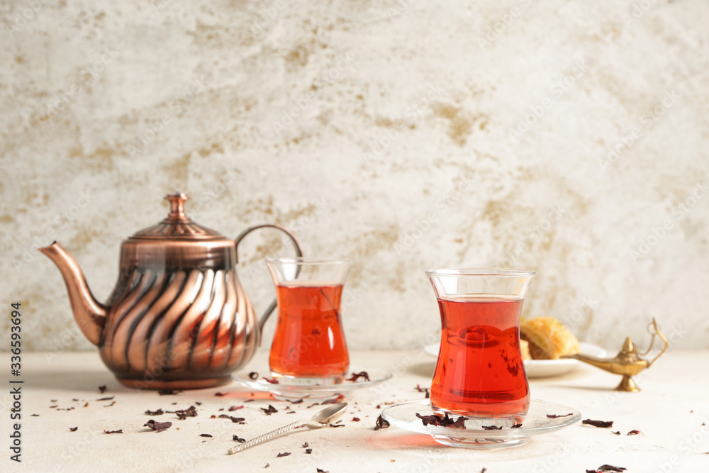 Wall mural tasty turkish tea on light background