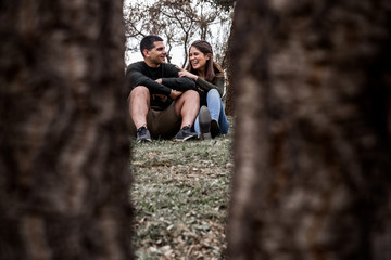 Fototapeta premium happy and loving couple sitting together