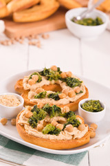 Friselle with turnip tops and hummus.
