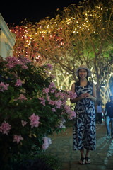 Women enjoying the decorative lights at Khao Wang, Phetchaburi, Thailand