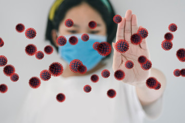 Young woman in protective medical mask quarantine herself at home to stop coronavirus or covid-19 pandemic.