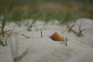 cigarette in the sand