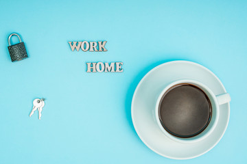 Coronavirus, covid-19. The inscription stay home on a blue background, a cup of coffee. Self-isolation and quarantine, personal protective equipment