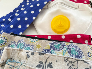 Corona virus worldwide protection. Homemade fabric protective mask. Respirator with filter.
