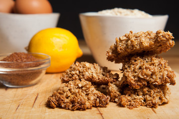 Handmade cookies and ingredients. Eggs, butter, brown sugar, lemon and oatmeal. Delicious!!