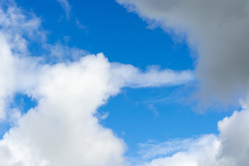 blue sky with fluffy clouds
