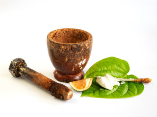 Mortar pound,  betel leaf and lime mortar mixed for eating to treat disease from the mouth.