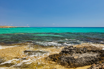 Rocky coast of the mediterranean sea with turquoise water