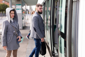 People boarding streetcar