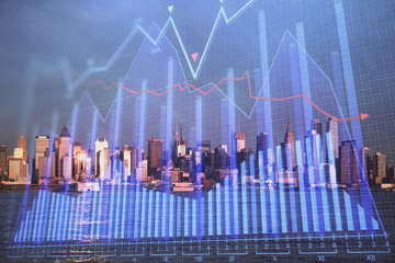 Naklejka premium Forex chart on cityscape with tall buildings background multi exposure. Financial research concept.