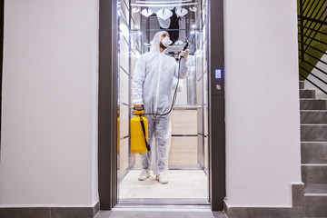 Sanitizing interior surfaces. Cleaning and Disinfection inside buildings, the coronavirus epidemic. Professional teams for disinfection efforts. Infection prevention and control of epidemic. 