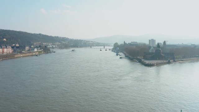 Cable car Seilbahn lift to the fortress ehrenbreitstein with Deusches Eck german corner Koblenz over the river rhine with a ship drone aerial shot 4k 25p