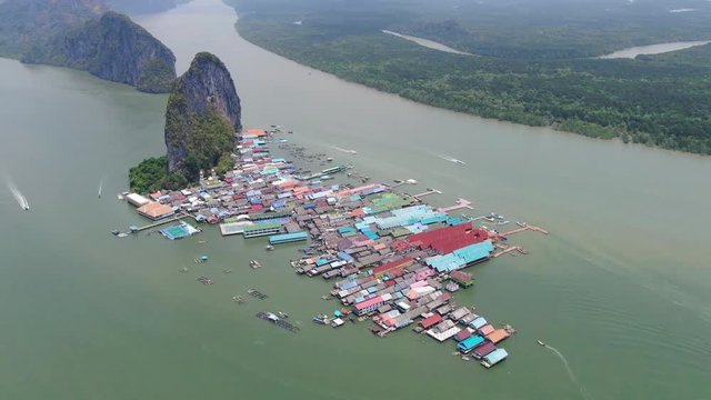 Drone shot of Aerial view over Ko Panyi floating village in south of Thailand. Ko Panyi is a fishing and muslim village in Phang Nga Province.