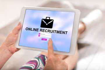 Online recruitment concept on a tablet