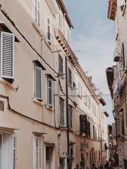 Travel summer concept. Old city view of Europe, Croatia, Istria region, Rovinj. Old buildings with shutters with pastel colors.