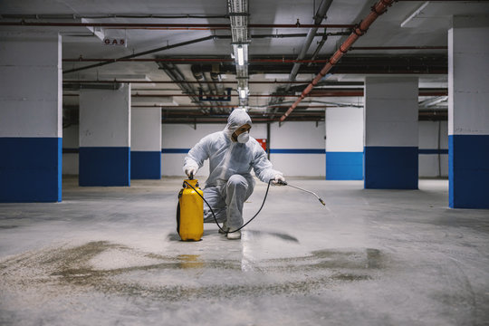 Sanitizing interior surfaces, garage. Cleaning and Disinfection inside buildings, the coronavirus epidemic. Professional teams for disinfection efforts. Infection prevention and control of epidemic. 