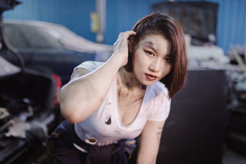 mechanic girl in the garage