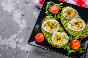 tasty and nutritious avocado sandwich and boiled egg