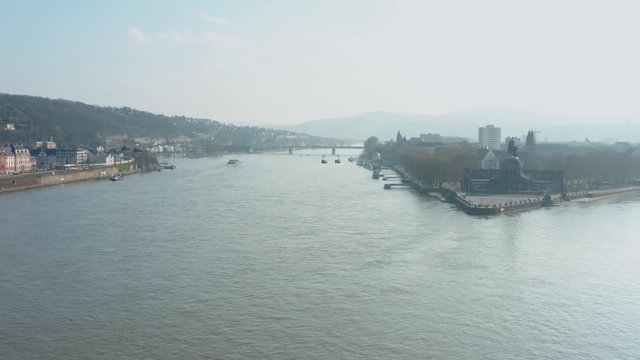 Cable car Seilbahn lift to the fortress ehrenbreitstein with Deusches Eck german corner Koblenz over the river rhine with a ship drone aerial shot 4k 30p