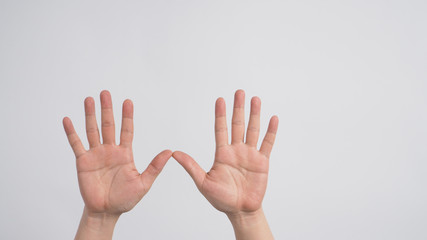 Empty two hands is spreading with palm on white background.