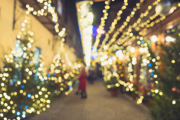 Christmas trees and lights decoration blured background. An abstract blur image of Christmas trees in New York City.