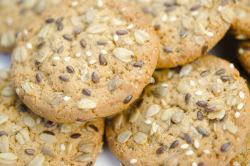 Cereal cookies with seeds and nuts close up. Healthy food, gluten free diet