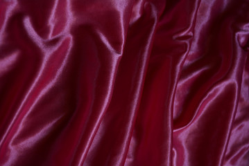 texture and pattern of folds on silk drapery