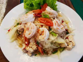 Shrimp vermicelli salad with chopped chicken Salad in white plate