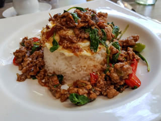 Stir-fried beef with basil and a fried egg served with steamed rice
