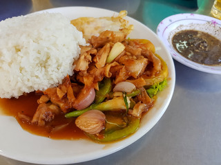 Cambodian food is called Lok Lak, an ingredient of Beef, Tomato, Lettuce, pepper sauce, served with steamed rice.