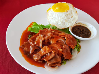 Cambodian food is called Lok Lak, an ingredient of Beef, Tomato, Lettuce, pepper sauce, served with steamed rice and fried egg