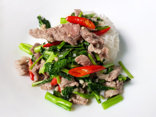 Stir-Fried kale with beef top on steamed rice