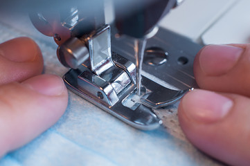 Sewing the medical mask on a sewing machine