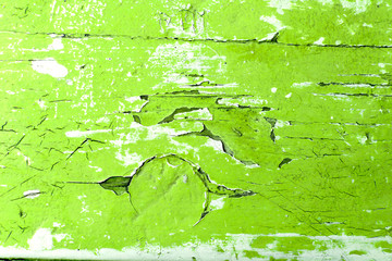 The old stripped wood surface is painted bright green.