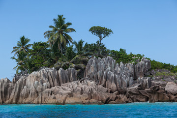 Fototapeta na wymiar Granite boulders on the ocean shore Seychelles islands