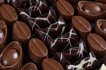 chocolate candies on black stone