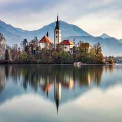 Morning view of famous lake Bled and small island with a church in Slovenia