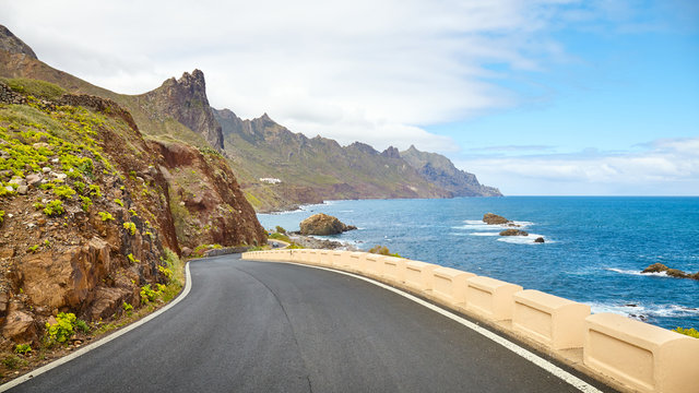 Scenic ocean drive by cliffs of the Macizo de Anaga mountain range, Tenerife, Spain.