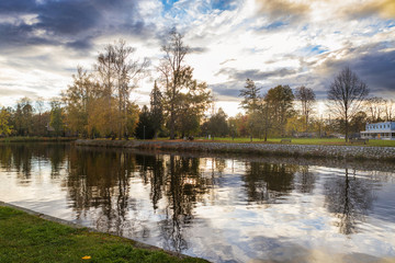 Beautiful reflection of the evening sky in Vltava river in the park of Ceske Budejovice town in Czech Republic