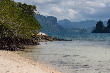 el nido beautiful landscape tropical beach with palm trees limestone rocks