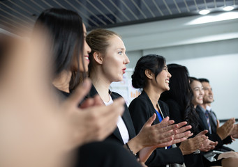Business people executives applauding in  business meeting